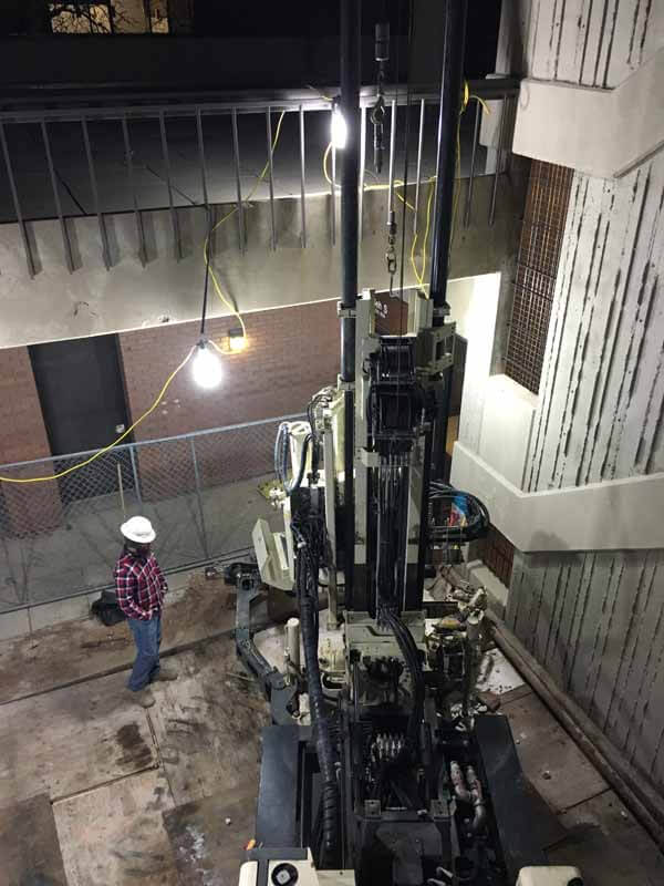 Thomas Maughan surveys the AGEC 3230DT and his work area during a site investigation surrounding an office tower in Salt Lake City.