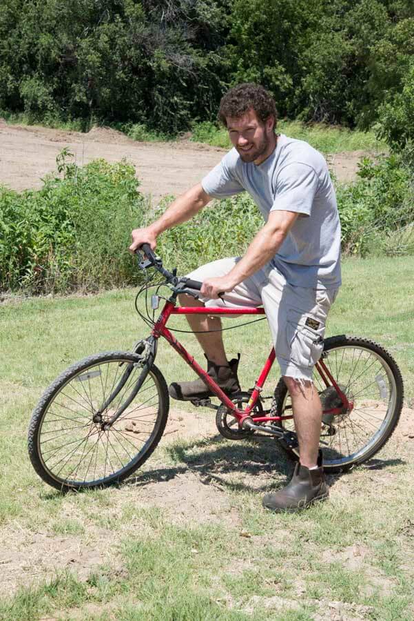 Name: Dustin’s Bike - Dustin Fross ... Plasma Press Brake Operator - Hand-me-down from R&D because of bent handle bars. “A bike that wasn’t good enough for them anymore because of the new fancy bikes they acquired!” Sleek red paint job and electrical tape holding the grips on. Used to deliver parts to the shop and to nearby buildings on campus.