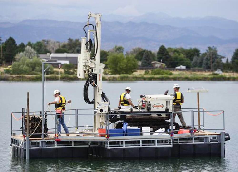 Drilling Engineers designed a barge to accommodate their Geoprobe® 7822DT for the geotechnical investigation on Erie Lake Reservoir.