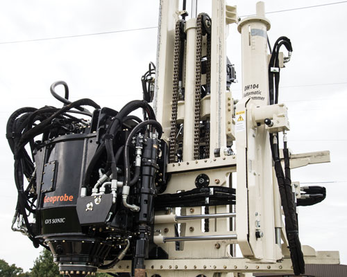 GV5 sonic drilling rig head includes centerline head side shift to position inside the tool string without moving mast or machine