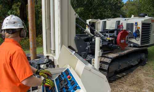 Dial in speeds, feeds, and pumps precisely while steering clear of spinning rods with adjustable swing arm control panel on 8250LS sonic drill rig.