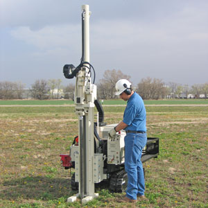 54LT mini drill rig uses direct push for environmental sampling