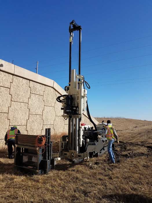 Driller Allen Hilgren and Engineer Alex Silvey perform CPT research for pile design at a bridge over Interstate 80 east of Lincoln, NE, using the 3230DT.