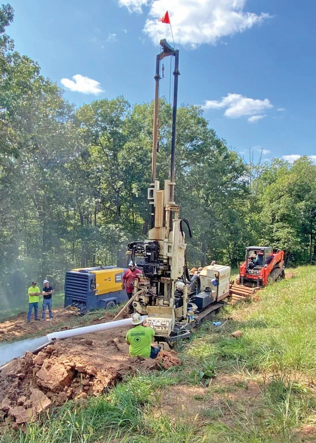 Double breakout on the 3230DT shines on a unique geothermal energy loop project initially attempted with down the hole hammer.