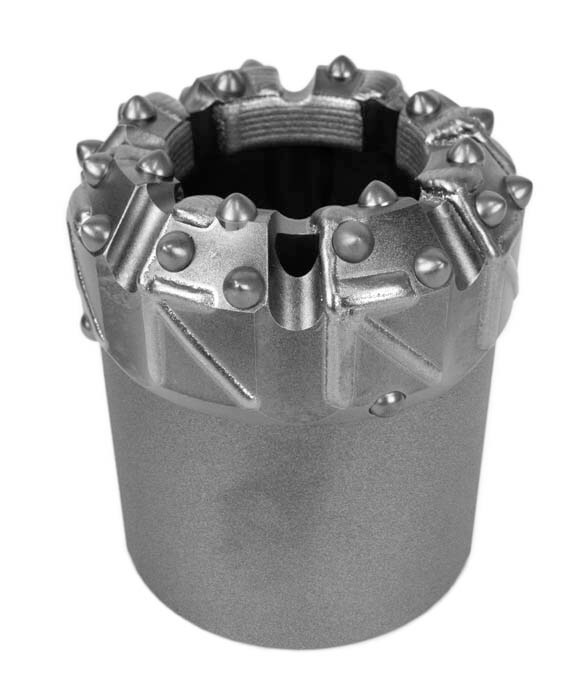 What looks like small weld beads on the bit are a carbide material precisely applied to not only the leading face, but also the outer and inner gauge where bit wear commonly occurs.
