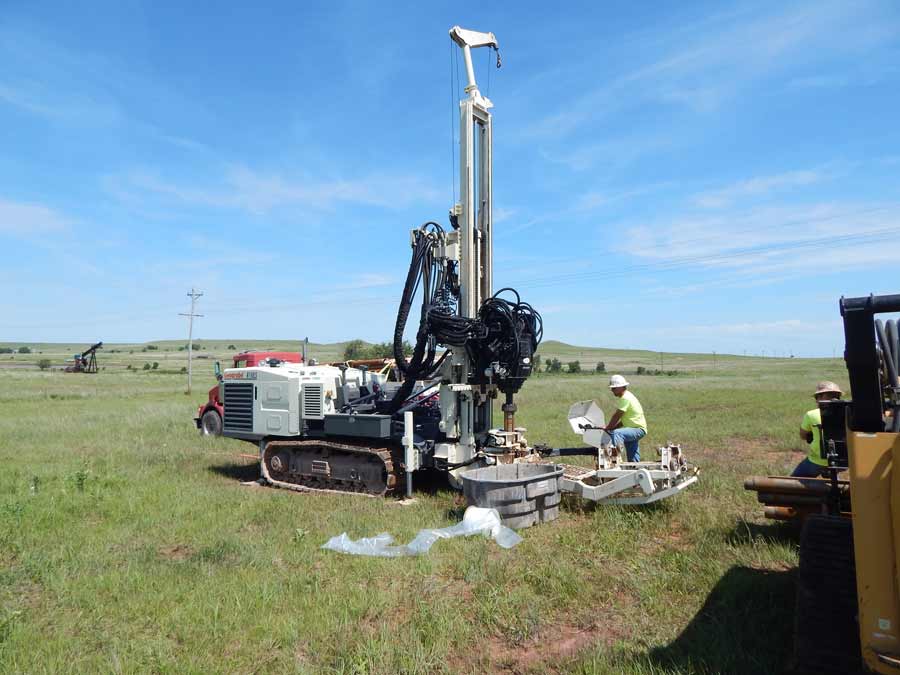 A man and his machine. Billy Graham, AEI Senior Environmental Driller, drills in the red dirt of central Oklahoma with AEI’s 8150LS Rotary Sonic.