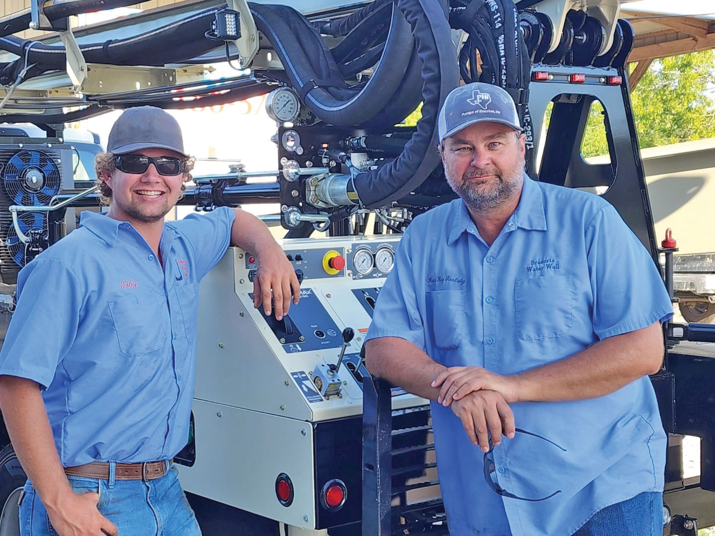 Toby, left, and father Ron, right, appreciate the attention engineers pay to drillers' concerns in designing the DM250.