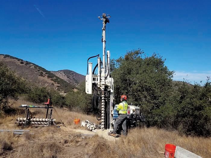 Geoprobe® 7822DT installing 2-inch monitoring casing to 30 feet, in remote mountains.
