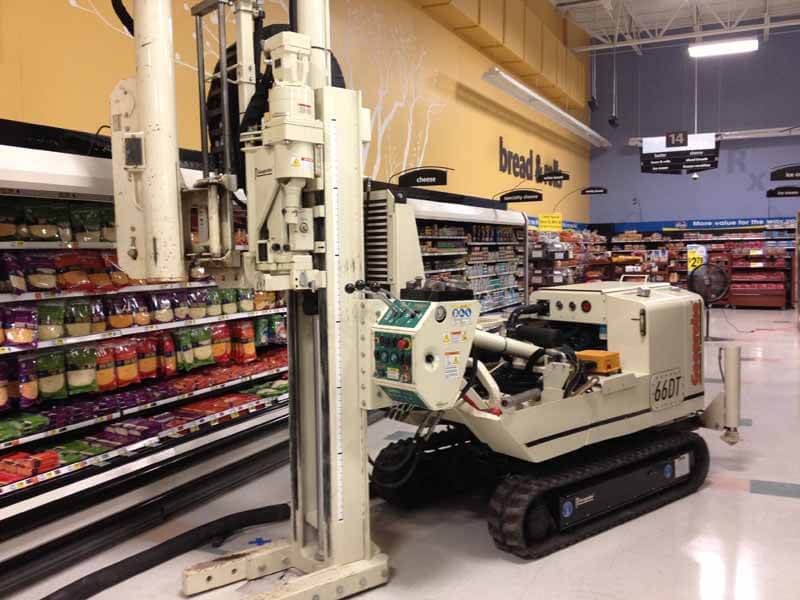 Nearly as shiny and clean as it was coming out of the factory, Geo Logic’s 66DT retrieves soil samples inside a grocery store (after hours).