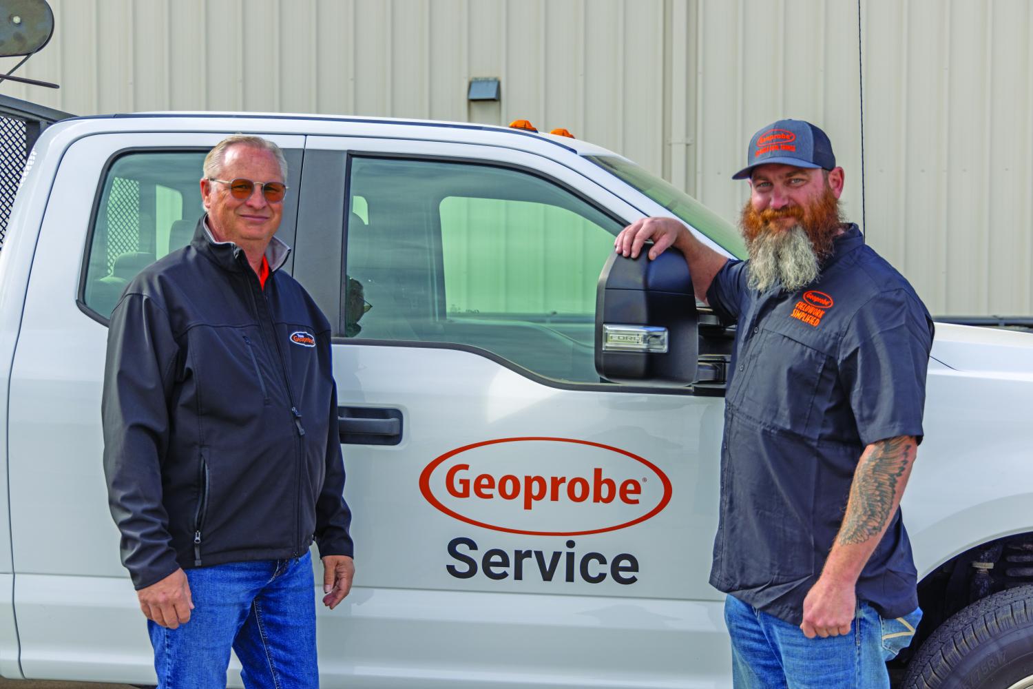 Location manager Todd Courbot (left) and rig mechanic Trevin Bolick (right) in front of the service center's first vehicle.