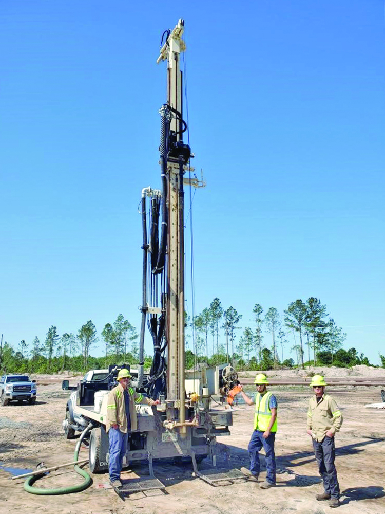 DM250 aids collecting soil samples while also installing dewatering wells on phosphate mine site. Pictured: Mallory Sawyer, Gerald Corbett, and Trevor Corbett.