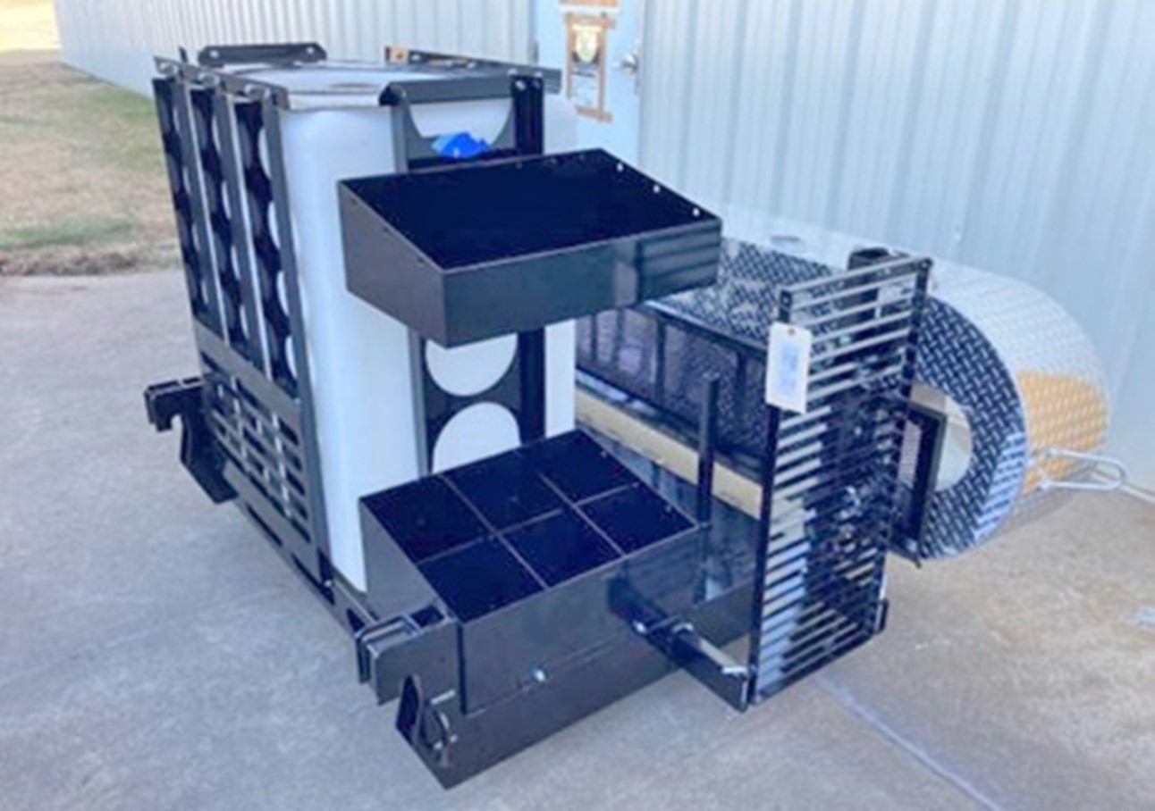 NEW Geoprobe® ‘super rack’ simplifies mobilizing for mud rotary, coming with a 100 gallon mud tub, hollow stem auger storage, and 150 gallon water tank with 2-inch male outlet.
