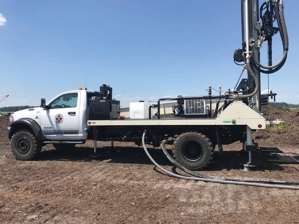 Drilling in an old ocean filled with sediment deposits millions of years ago can mean some soggy ground conditions, but going from track to truck hasn’t slowed Trader Construction down.         