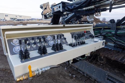 Swing-arm control panel with built-in safety features and diagnostic tools.