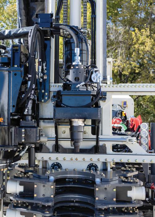 Geoprobe® engineered and manufactured GV5 sonic head with DMR7 rotary head along centerline head side shift to position over hole without moving machine.