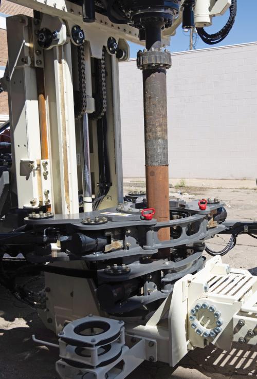 Double wrench breakout on 8150LS sonic drilling rig makes quick work of breaking tool strings.