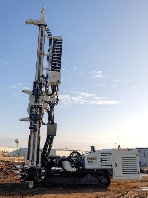 Work in restricted spaces with fully articulating drill mast suited to serve as tieback drills.