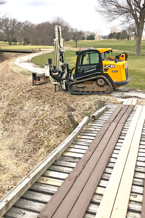 Minimize ground disturbance on delicate sites like golf courses while trekking your CPT rig distances with 20CPT press mounted to a skid steer.