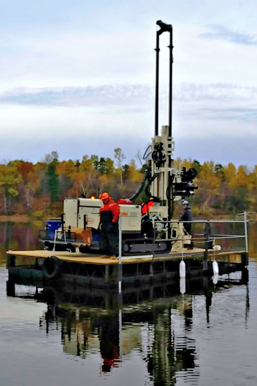 Collecting sediment samples using dual wall direct push methods to complete a geotechnical investigation of a former hydroelectric dam in northern New York.