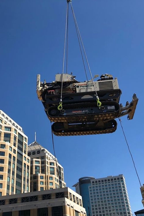 Engineered to separate into sections for helicopter transport, the lightweight 6712DT also rises to the occasion via crane for remediation work in tight downtown site.