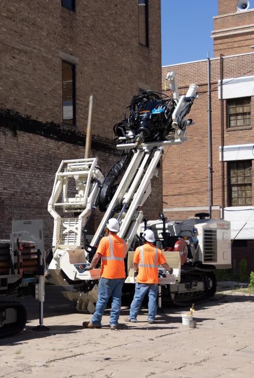 Tracks and small footprint of 8150LS sonic drilling rig facilitate investigations in tight urban spaces.