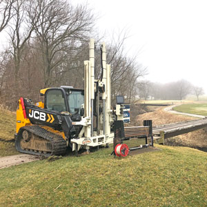 20CPT Press on a skid steer minimizes damage to golf course