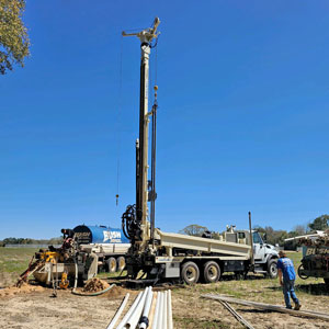 DM450 truck mounted water well drilling rig amplifies production on commercial jobs.